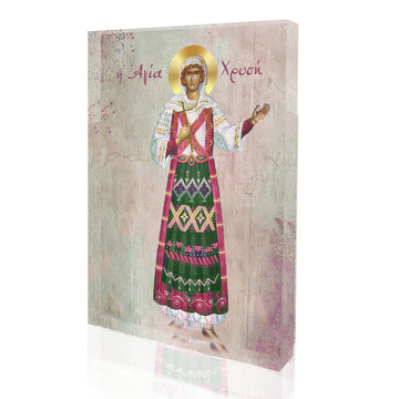 An icon of Saint Chrysi with a 3D effect, featuring a female saint in a colorful, traditional attire, with a prominent 'X' in the background.