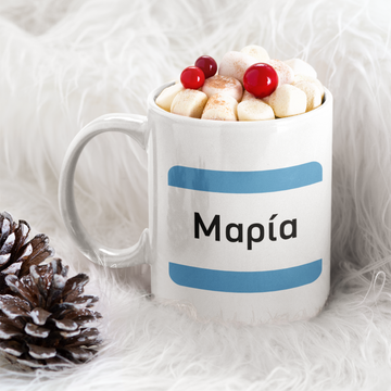 A white ceramic mug with a greek street sign or town sign on it. Greek Name is Maria and looks like a road sign. blue stripes and greek name.