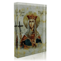 An icon of Saint Olga featuring the saint holding a cross and wearing a crown, with a 3D effect on a plexiglass surface.