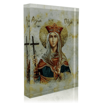 An icon of Saint Olga featuring the saint holding a cross and wearing a crown, with a 3D effect on a plexiglass surface.