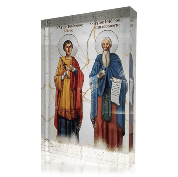 A plexiglass icon depicting two Orthodox Christian saints, Isidore the Farmer and Ignatius the Archbishop, in vibrant colors with a 3D effect.