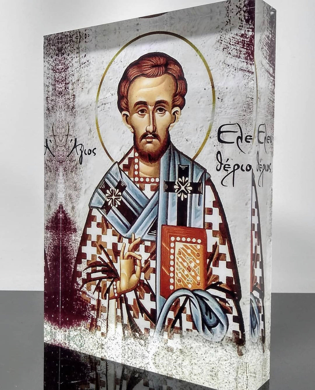 A handcrafted icon of Saint Eleftherios, featuring a 3D effect, with monochrome and color elements on a plexiglass panel.