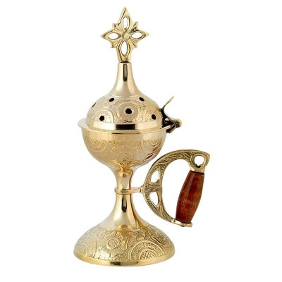 Gold incense burner with a wooden handle 