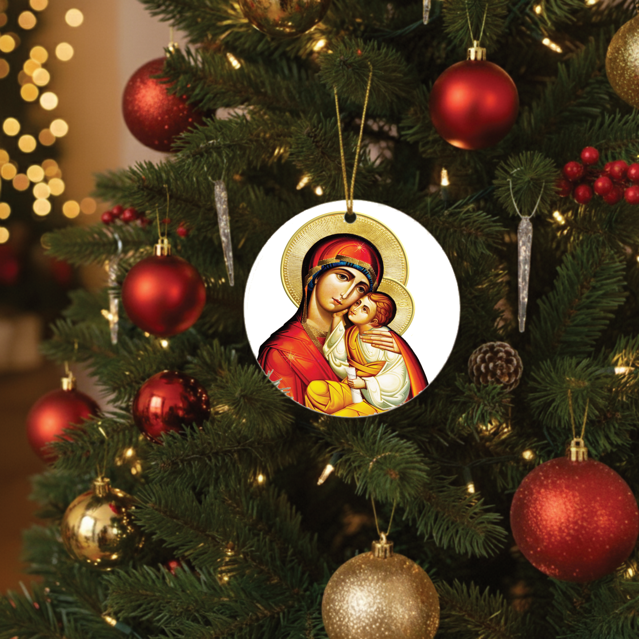 Decorative Christmas ornament featuring the Virgin Mary Panayia on a Christmas tree with red and gold ornaments.