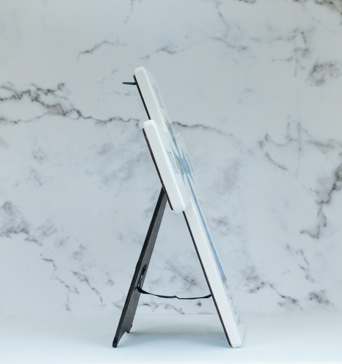 Ceramic cross featuring the Lord’s Prayer in Greek with Virgin Mary icon and floral details.