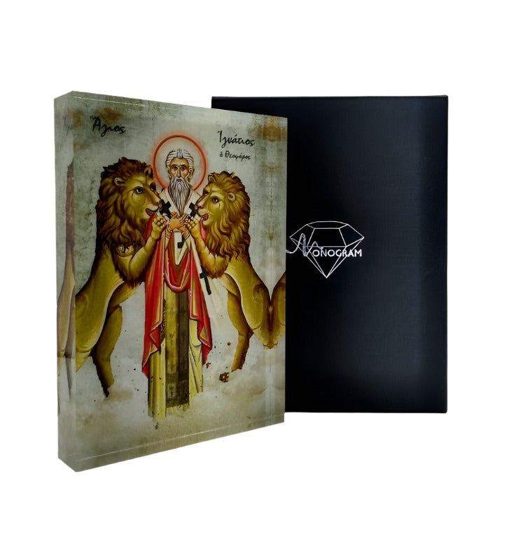 Icon of Saint Ignatius with a 3D effect, surrounded by lions, in a vibrant and detailed portrayal, with a black background and the Monogram Atelier logo.