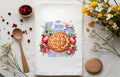Decorative tea towel with 2026 design featuring a vasilopita with cross design, and  pomegranates, 