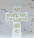 Ceramic cross featuring the Lord’s Prayer in English with gold text and central cross detail.