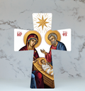 Decorative cross of the holy family, religious figures on a marble background