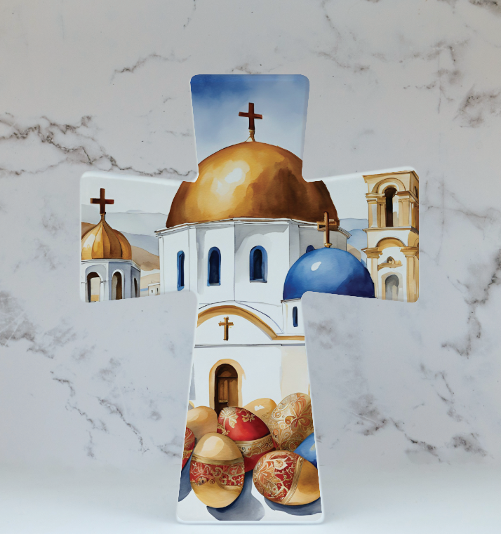 A ceramic Easter cross with a glossy white finish and decorative gold patterns, featuring the text 'Kalo Paska'.