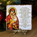 Orthodox icon of Panayia holding Christ. Handmade slate Greek icon featuring the Lord’s Prayer in Greek or English, displayed on a brass stand.
