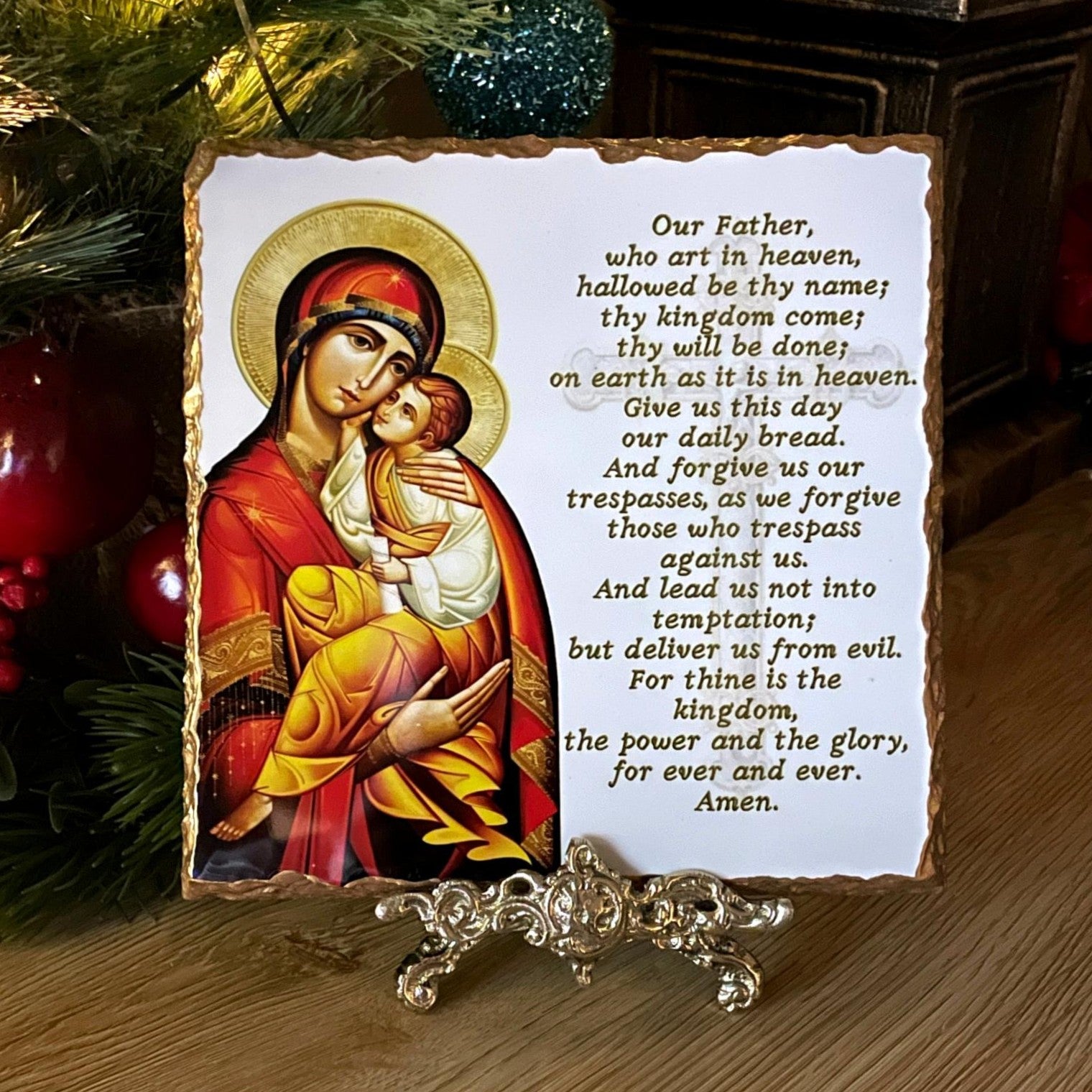 Orthodox icon of Panayia holding Christ. Handmade slate Greek icon featuring the Lord’s Prayer in Greek or English, displayed on a brass stand.