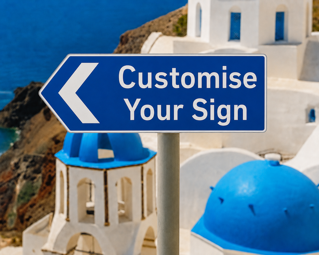 Taverna Greek metal sign displayed outside a Greek-style outdoor dining area with blue and white décor