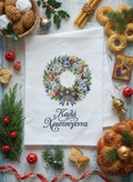 Greek Christmas tea towel with blue and green festive wreath and Greek Christmas greeting