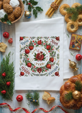 Greek Christmas tea towel with red pomegranate wreath and festive Greek-inspired details