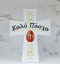 A ceramic Easter cross with a glossy white finish and decorative gold patterns, featuring the text 'Kalo Paska'.
