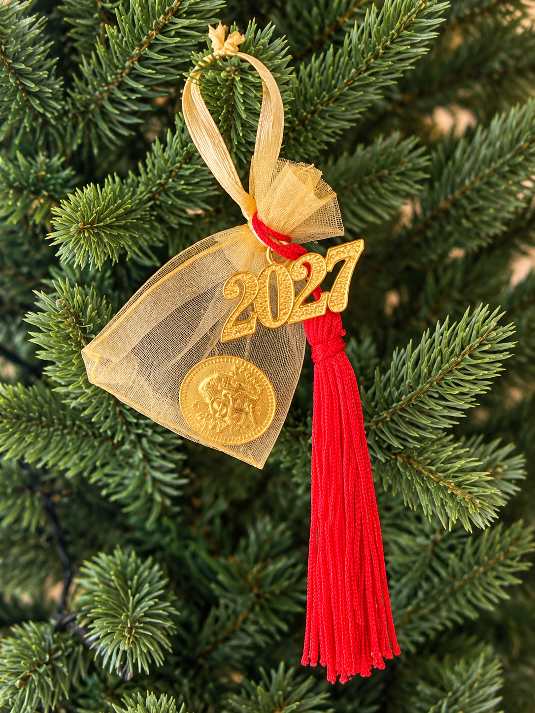 Gold colour Greek Vasilopita coin flouri for New Year tradition and good luck