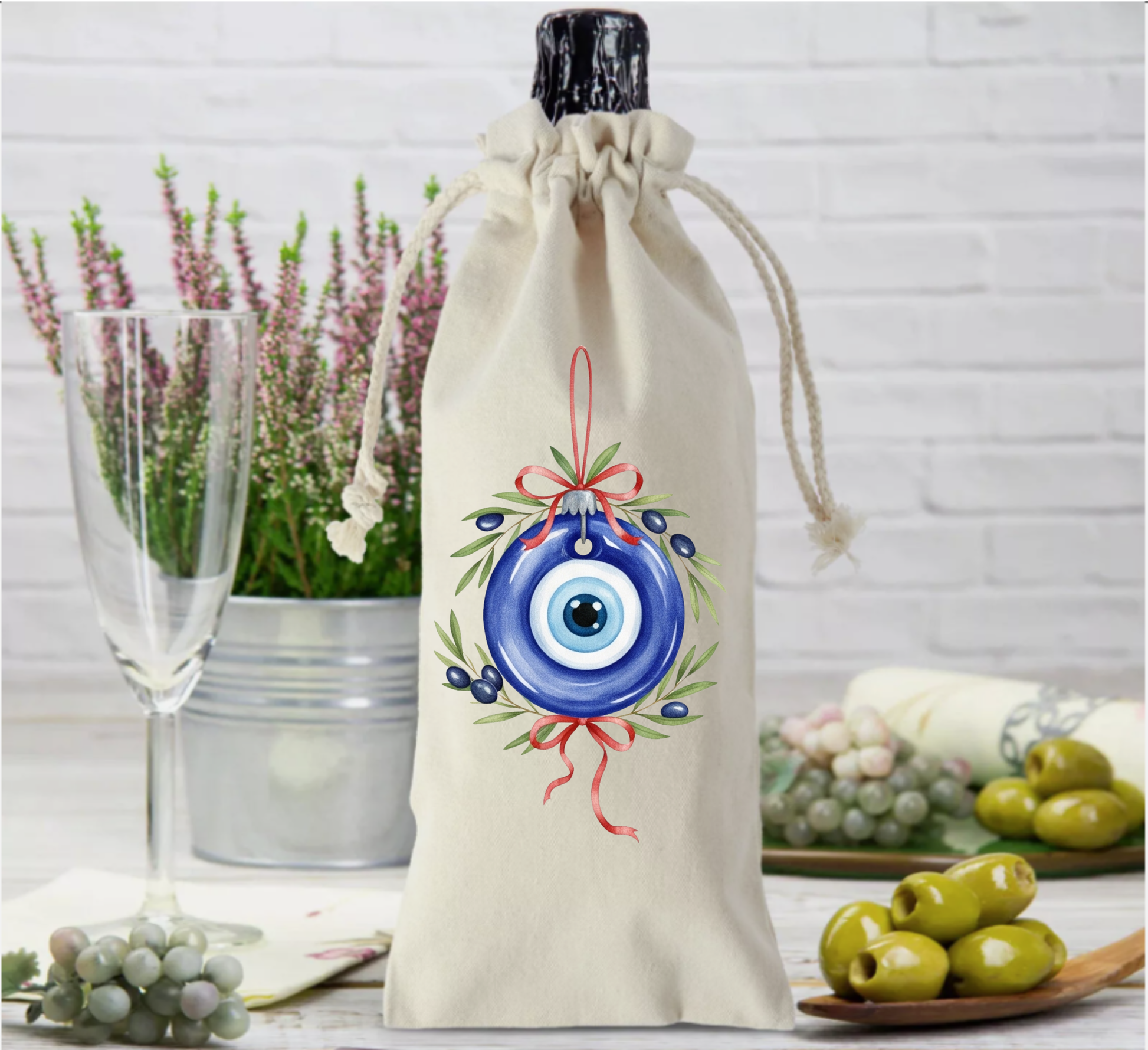 Drawstring bottle bag with an evil eye design.