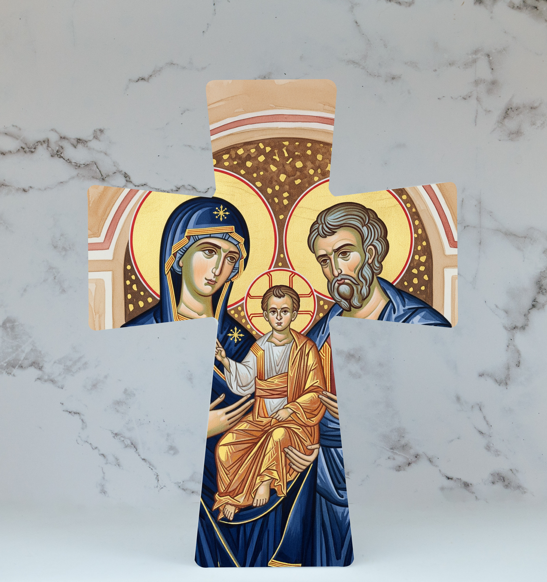 Decorative cross with religious iconography on a marble background