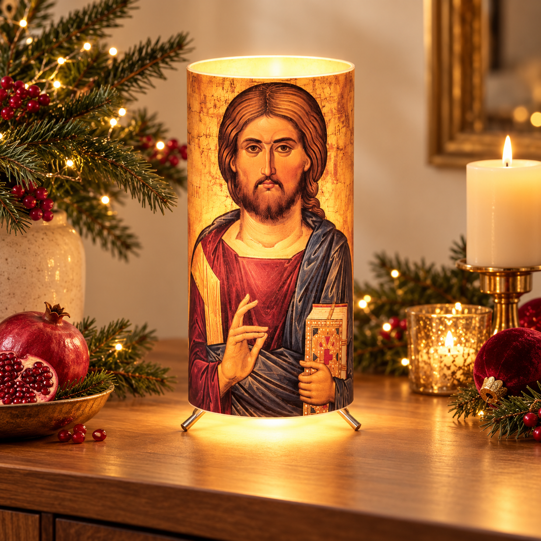 Illuminated Jesus Christ Orthodox icon lamp styled with festive Christmas greenery, candles and pomegranates