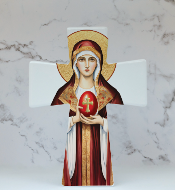A ceramic cross featuring an artistic depiction of Mary Magdalene with a glossy finish. It can stand freely or be hung on the wall.