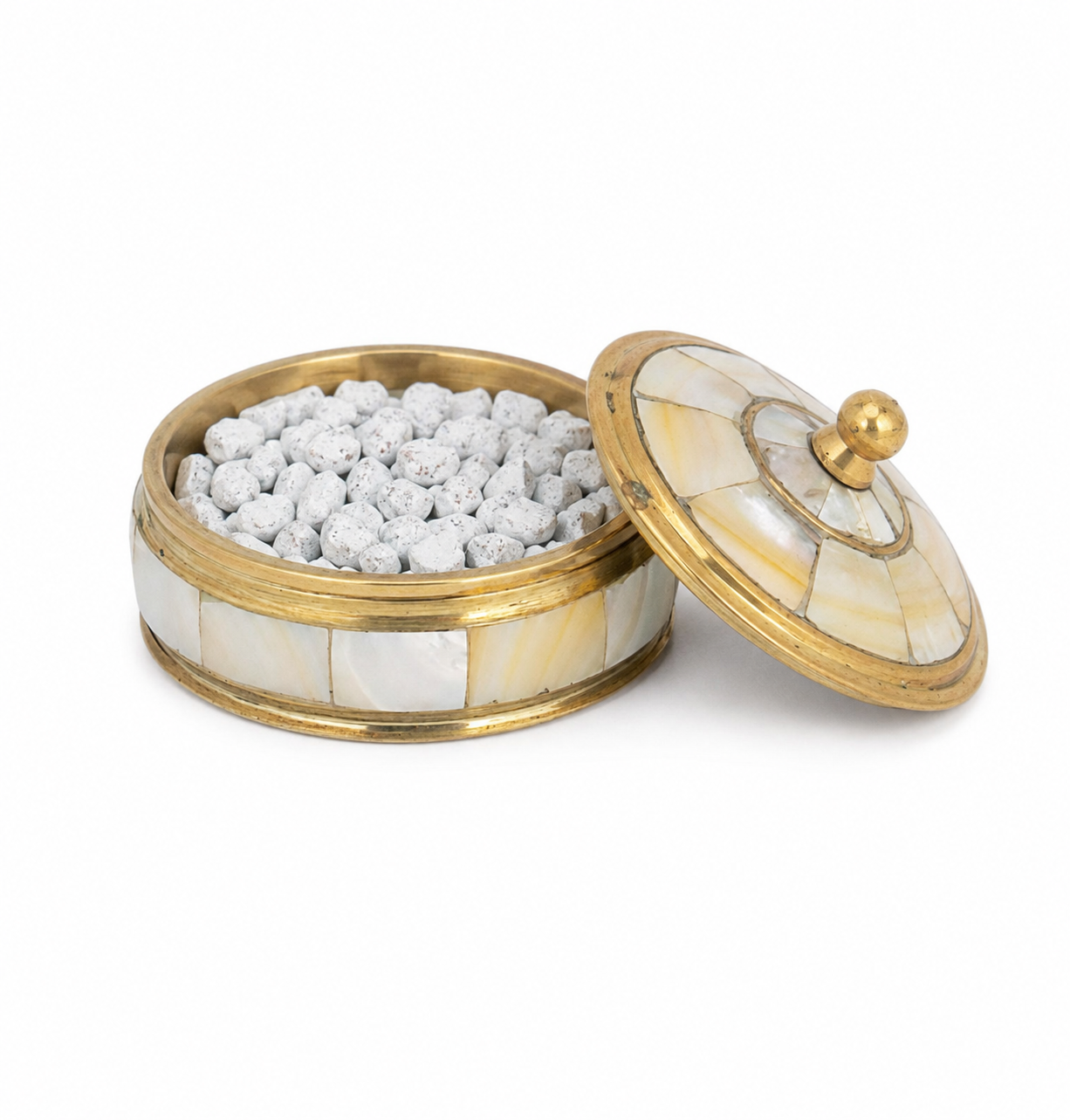 Open mother of pearl incense holder with incense and lid placed beside it