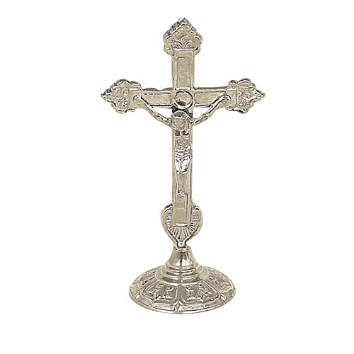 An Orthodox brass cross with a gold or silver finish, showcasing a contemporary design with intricate details.