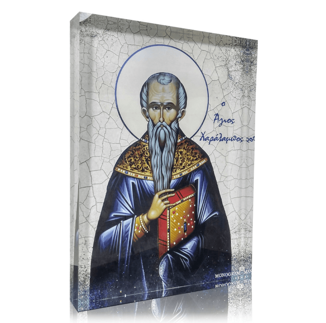 An icon of Saint Haralambos wearing a blue and gold robe, with a book and a staff, against a white and blue background with a cracked texture.