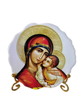 Round ceramic icon plate featuring the Theotokos in Orthodox style.
