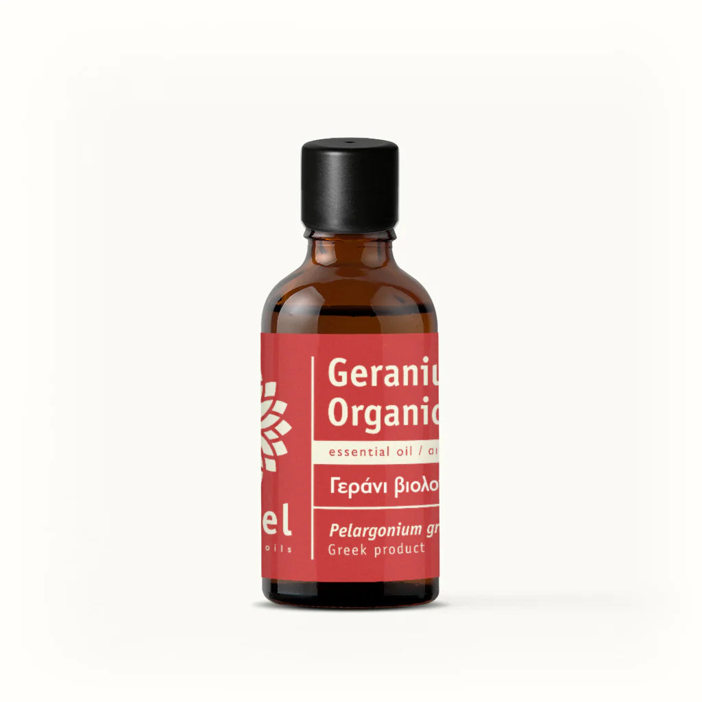 A bottle of Geranium Organic Essential Oil with a red label on a white background.