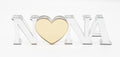 A personalized acrylic plaque with the name 'Nona' cut out in the shape of a heart, with a mirror like finish.