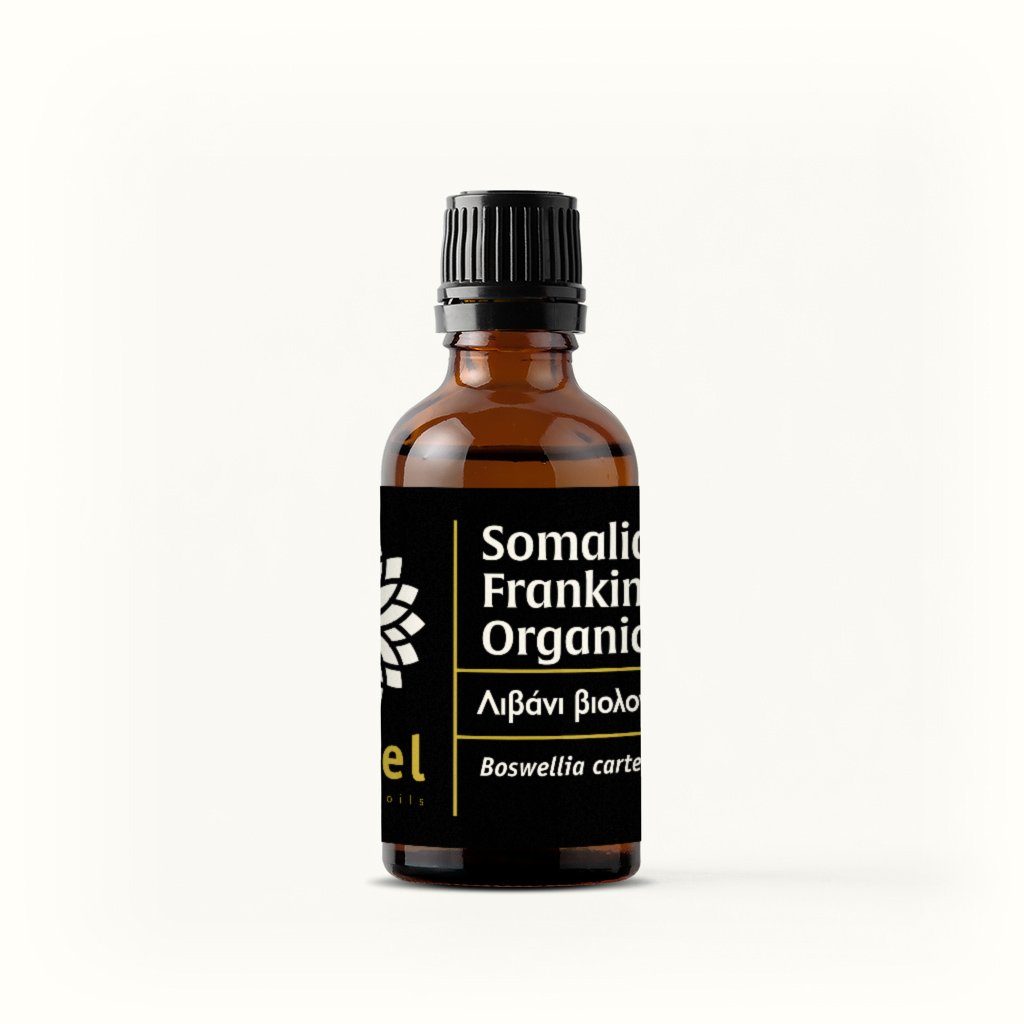 A bottle of Somalian Frankincense Organic essential oil with a white label and yellow text.