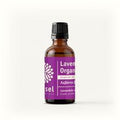 A bottle of organic Greek lavender essential oil with a purple label and cap, branded by Vessell
