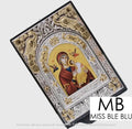 A decorative icon box with a colorful religious icon depicting the Virgin Mary and child Jesus, surrounded by a silver ornate frame.