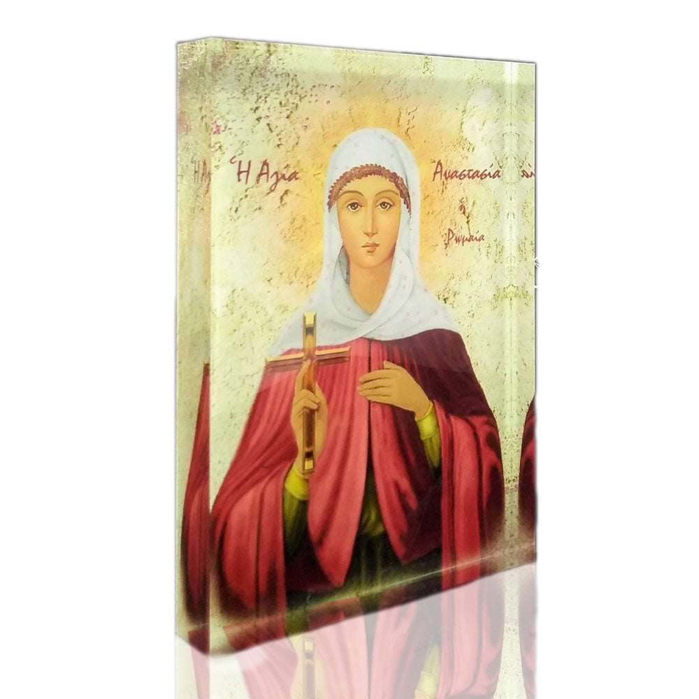 Orthodox icon of Saint Anastasia Pharmakolytria on plexiglass. Handmade Greek icon showing Saint Anastasia holding the healing cross against a light textured background.