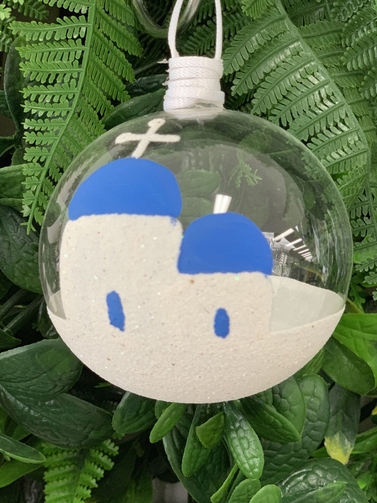 Clear hand-blown Greek glass Santorini Christmas bauble with white church and blue dome design
