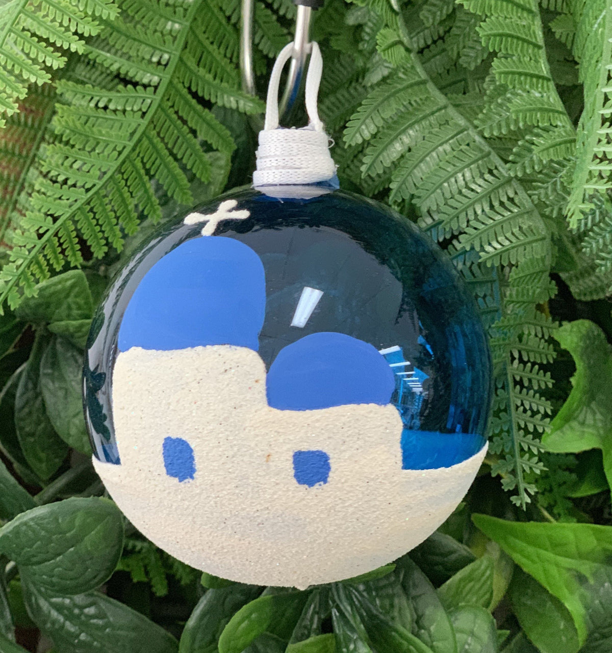 Hand-blown Greek glass Santorini Christmas bauble with blue domes and white church design, handmade in Thessaloniki Greece