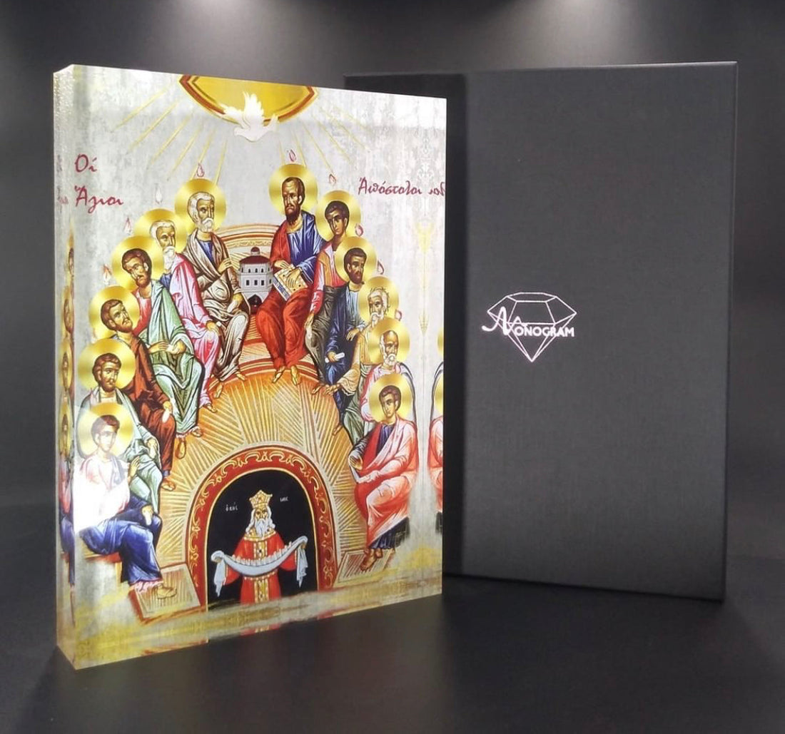 A handcrafted icon depicting the Twelve Apostles, with a 3D effect, displayed in a protective plexiglass case.